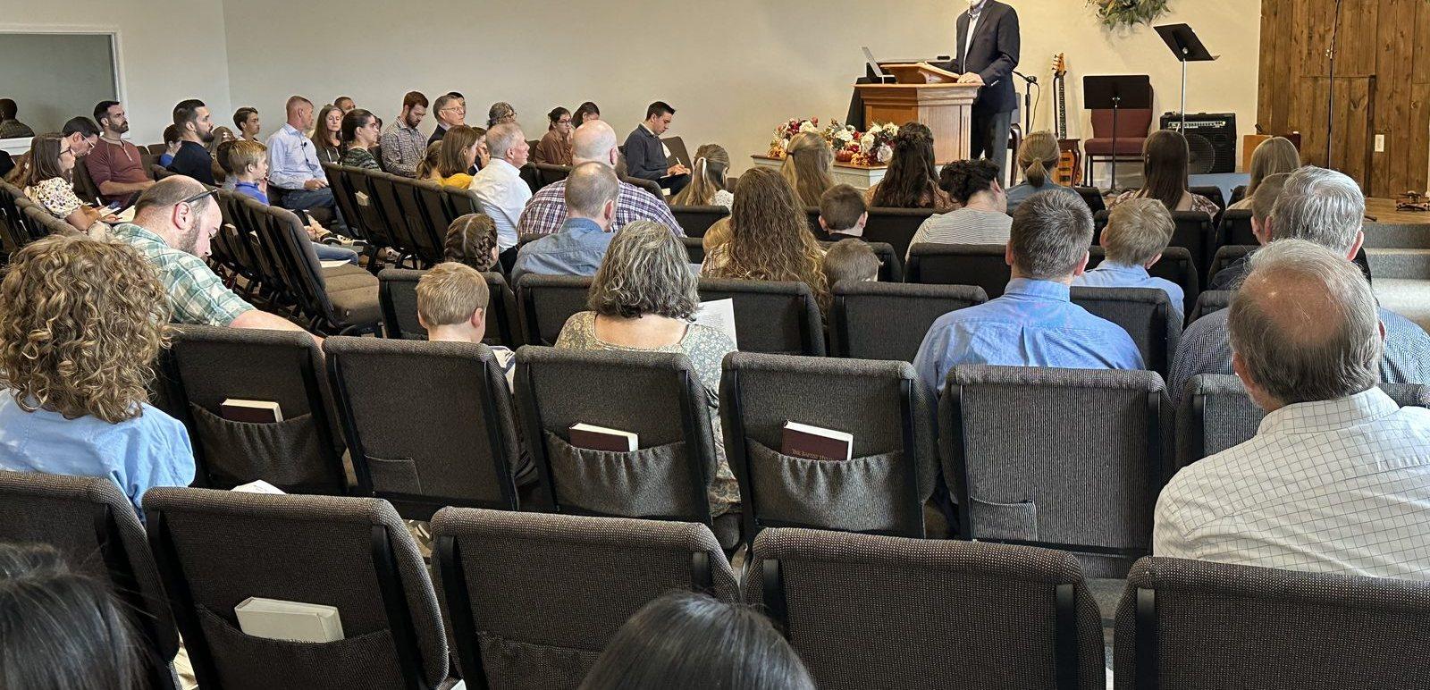 The congregation seated together during a service