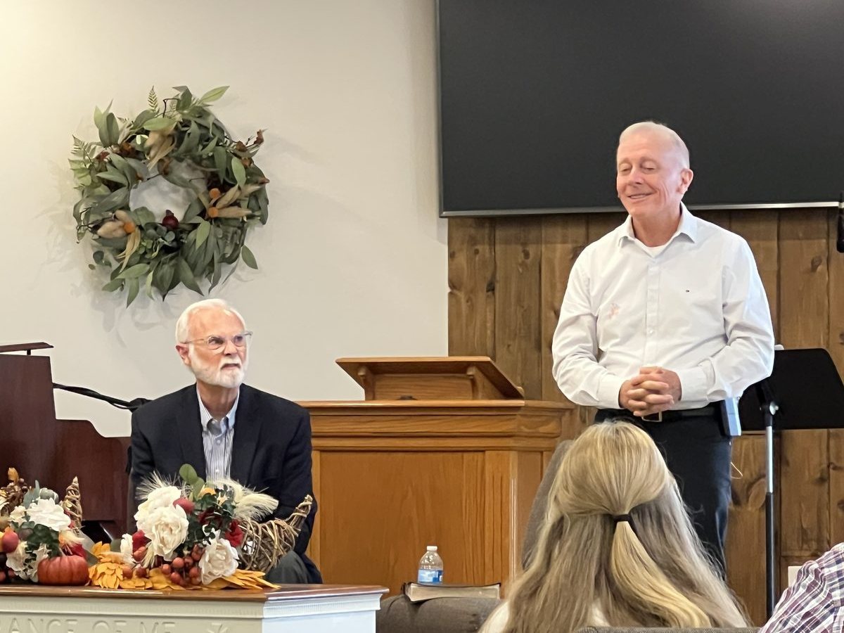 A guest preacher speaking at a Grace Community Church Bible conference